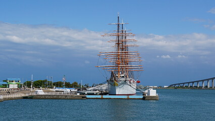 Toyama Port under Blue Skies: Bridges and Sails over the Japan Sea