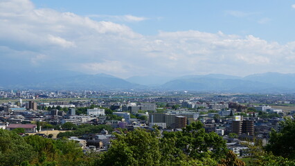 Obraz premium Toyama Port under Blue Skies: Bridges and Sails over the Japan Sea