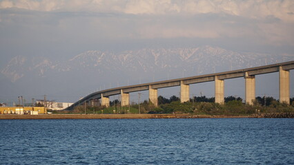 Toyama Port under Blue Skies: Bridges and Sails over the Japan Sea