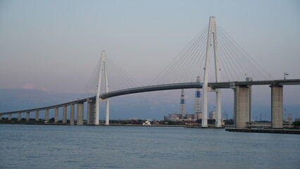 Toyama Port under Blue Skies: Bridges and Sails over the Japan Sea