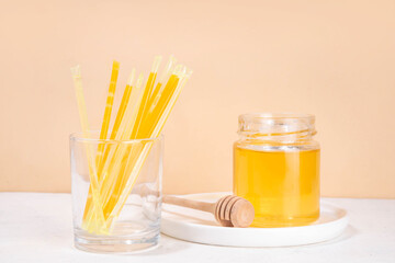 Homemade honey sticks. Portable straws with golden honey, healthy organic treat