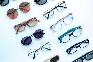 Group of glasses. Fashionable assortment of glasses in various styles and colors.