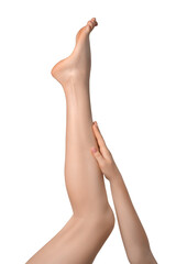 Well-groomed woman's legs isolated on white background, pointing up, hand on a shin.