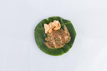 Healthy Fresh Lotek - Indonesian Mixed Vegetables & Tofu with Rich Peanut Dressing, Boiled Egg & Crackers. Isolated in White Background