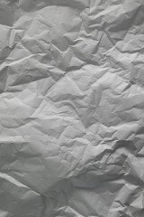 Fototapeta premium Crumpled White Paper Texture in Natural Light as a Background