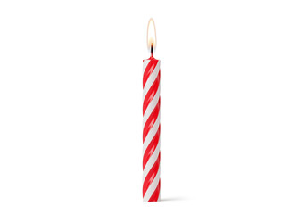 Single red and white striped birthday candle lit with flame
