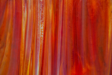 Vibrant abstract texture with fiery swirls and molten gradients