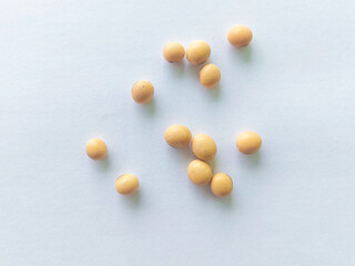 Pile of soybeans or soybean seeds isolated on white background. Whole dried soybeans.