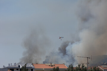 Aerial firefighting operation during wildfire near Mem Martins, Sintra, Portugal – 2025