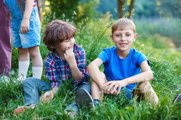 Fototapeta premium Children spending time in nature on summer day
