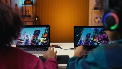 Brother and sister playing racing game on laptops, losing team competition - Powered by Adobe