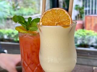 Soursop, banana and mango smoothies juice with watermelon juice with a cafe background