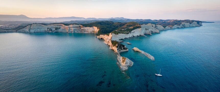 Panoramic aerial view of Cape Drastis, majestic cliff at the north of Corfu Island, Greece.