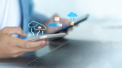 Close-up hand using a smartphone for cloud file transfer with upload and download icons. Concept of digital storage, backup, and wireless data synchronization.