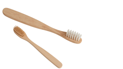 Two eco-friendly bamboo toothbrushes in a minimalist style, promoting sustainable oral hygiene.