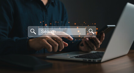 Digital Search: A person is engaging in a digital search, using a laptop and mobile phone, as the search interface hovers over the devices.