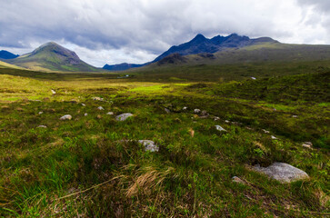 Fototapeta premium The peaks of Sgurr nan Gillean (965m, centre), Am Basteir (935m) and Basteir Tooth (915m) in the Cuillen ( Cullin ) on the Isle of Skye, Scotland, UK