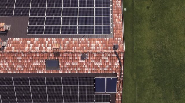Aerial Video of Modern House Roof with Solar Panels and Tiled Shingles