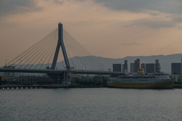 Historic passenger car roro ro-ro ferry cruiseship cruise ship liner Hakkoda Maru in Aomori, Japan with city skyline