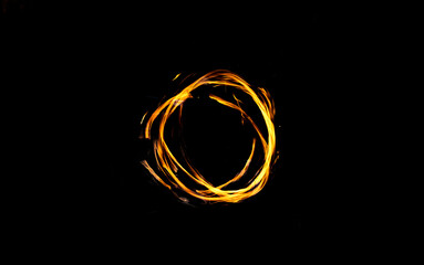 Ring of fire circular trail glowing vividly in the darkness