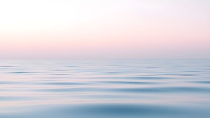 Fototapeta premium 일몰이 지는 노을지는 날씨의 평화로운 잔잔한 바다 흐린 블러처리The peaceful calm sea of sunset is cloudy