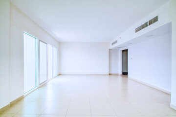 Fototapeta premium Clean unfurnished apartment interior showcasing spacious layout, raw architectural details, and abundant natural light. Ideal for real estate listings. Series.