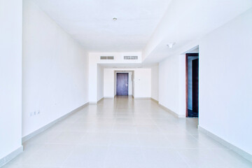 Clean unfurnished apartment interior showcasing spacious layout, raw architectural details, and abundant natural light. Ideal for real estate listings. Series shots