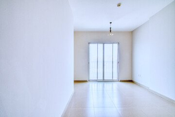 Clean unfurnished apartment interior showcasing spacious layout, raw architectural details, and abundant natural light. Ideal for real estate listings. Series shots