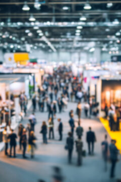Blurred Trade fair show background, exhibition with booths for business, companies and industry to showcase and demonstrate products and services, for people, partners and customers
