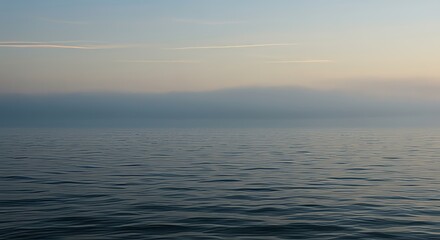 Obraz premium Minimalist Ocean Horizon at Dawn with Soft Gradient Sky and Gentle Ripples – Tranquil Seascape Background for Meditation, Calm, and Mindfulness Themes