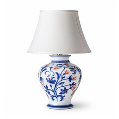 Floral pattern lamp with a shade on a table isolated on white background