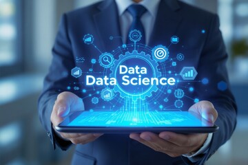 Businessman holding a tablet displaying data science and digital network connections