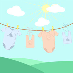 A newborn baby's clothes are drying on a rope outside.Vector illustration of a child's clothes.