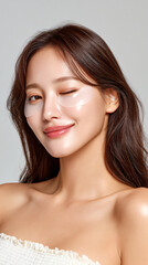 Fototapeta premium Young Woman with Aegyo-Sal Makeup and Glossy Patches for Skincare Ads