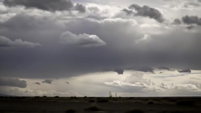 Storm clouds over a desert landscape