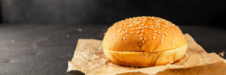Bun burger puffy soft buns baking fresh delicious gourmet food background on the table rustic food top view copy space