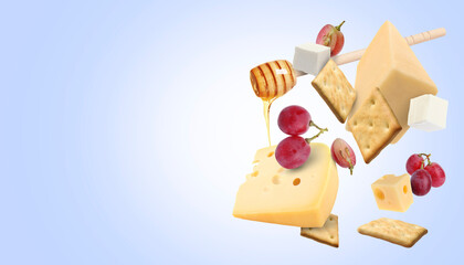 Cheese board products in air on blue gradient background. Different types of cheese, grapes, crackers and honey