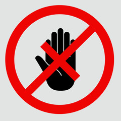 Obraz premium A prohibition sign featuring a black hand with an open palm crossed out by a red circle and diagonal line, indicating 