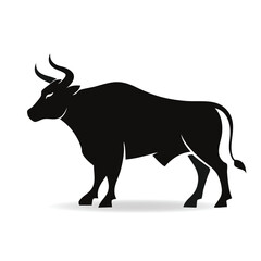 Fototapeta premium Powerful Silhouette of a Black Bull with Majestic Horns Standing Firmly