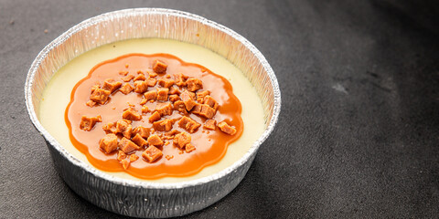 Cheesecake salted caramel sweet dessert fresh delicious gourmet food background on the table rustic food top view copy space