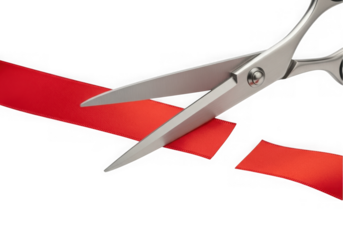 Silver scissors cutting a red ribbon isolated on transparent background