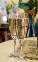 Pouring and tasting of dry sparkling wine brut, grand reserve, champagne in Ay-Champagne wine making village in Vallee de la Marne, , Champagne region, France