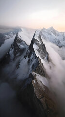 Fototapeta premium Majestic Mountain Peaks Pierced By Cloudscape
