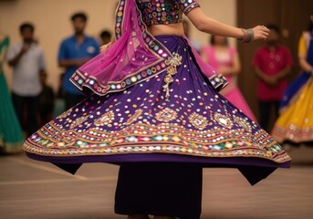 Naklejka premium Woman twirling in colorful traditional lehenga during Navaratri celebration with blurred festive background