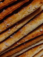 Closeup of Crispy Salted Crackers Layered Perfection.