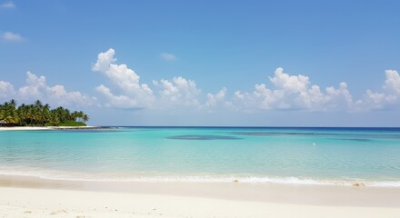 Empty White Sand Beach with Crystal Clear Water and Blue Sky
