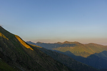 Fototapeta premium sunset over the mountains fagaras carpathians ridges mountain chain eastern europe