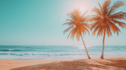 Fototapeta premium Two palm trees on a tropical beach at sunrise.