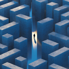 Man walking through blue maze with tall walls casting long shadows in low light