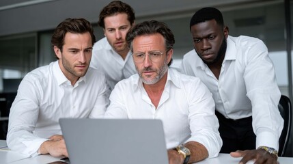 Business Team Collaborating on Laptop in Modern Office Environment